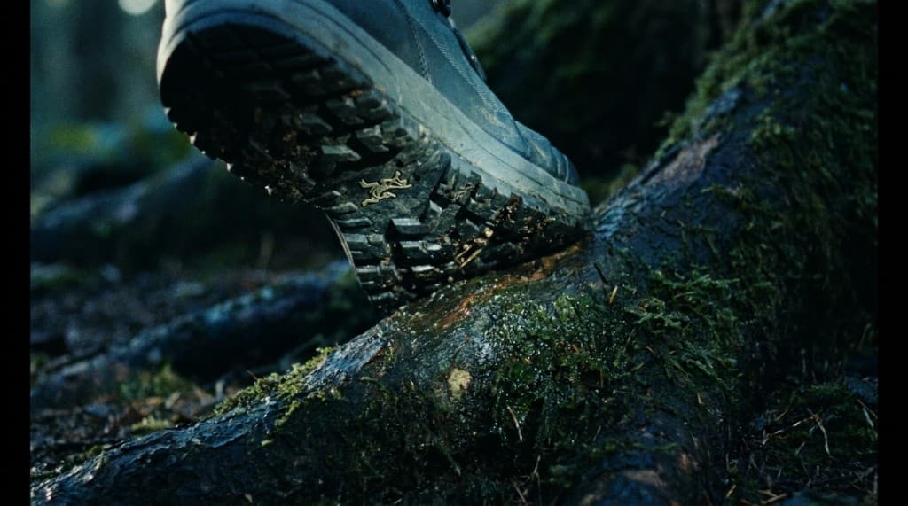 Outsole gripping a mossy root